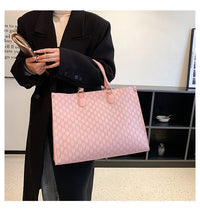 Large-capacity women's bags in Europe and the United States retro shoulder bag classic letters PU commuter handbags women