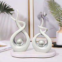 A pair of simple and modern home decoration ornaments