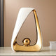 Elegant White & Golden Ceramic Statue with Glossy Finish